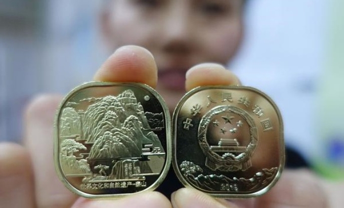 원각 모양에 발매 수량이 적어 태산 기념주화의 인기가 치솟고 있다. 사진=경제사