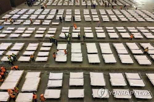 우한 전시장의 신종코로나 환자 위한 병상(사진=연합뉴스/해동주말 제휴사)
