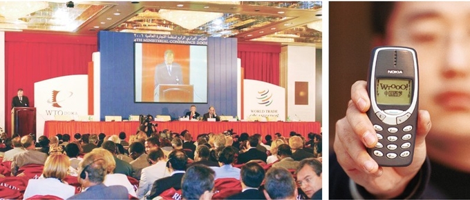 중국은 2001년 11월 10일 카타르의 수도 도하에서 열린 세계무역기구(WTO) 제4차회의에서 심의의결을 통해, WTO 에 가입했다. 오른쪽 사진은 당시 세계 휴대폰시장을 석권하던 노키아의 무선전화기. 치우스왕 캡쳐.