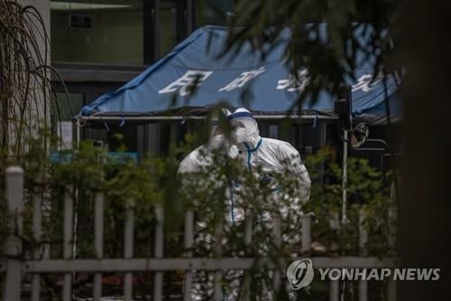 중국 우한서 코로나19 기원 조사하는 WHO팀. 사진=연합뉴스 제공